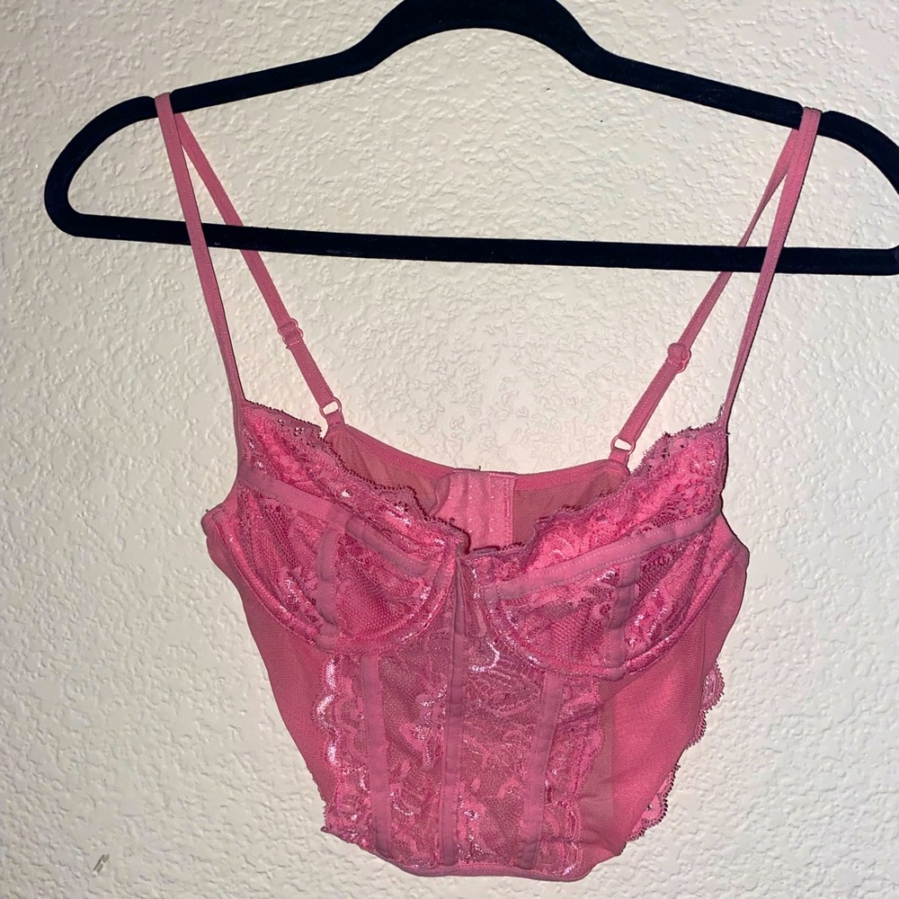 I am selling a cowl crop top from Tilly’s it is a corset front and back